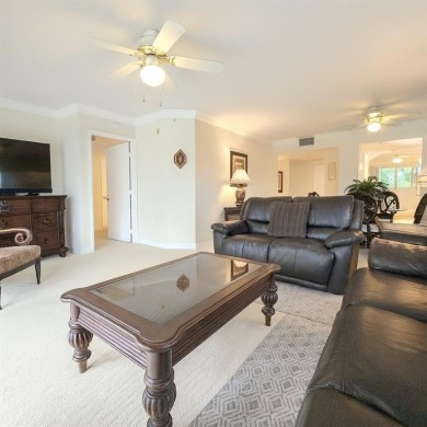 Spacious, sunlit 2-bed, 2-bath corner condo in the sought-after on Flamingo Lakes Country Club in Florida - for sale on GolfHomes.com, golf home, golf lot