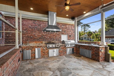 This beautiful all-brick traditional home is situated on a on The Dunes Golf and Beach Club in South Carolina - for sale on GolfHomes.com, golf home, golf lot