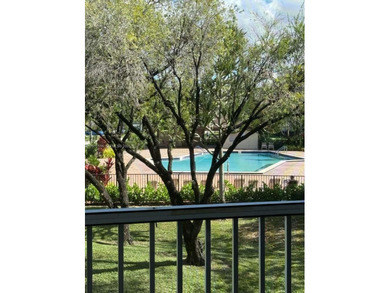 Located on the 2nd floor of an elevator building, this unit on Flamingo Lakes Country Club in Florida - for sale on GolfHomes.com, golf home, golf lot