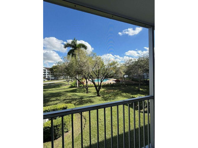 Located on the 2nd floor of an elevator building, this unit on Flamingo Lakes Country Club in Florida - for sale on GolfHomes.com, golf home, golf lot