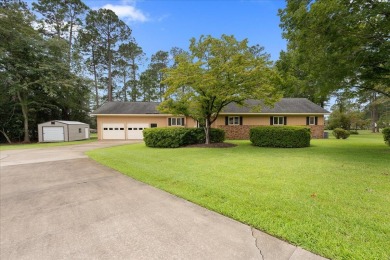 Welcome to this charming 3-bedroom, 2-bath ranch-style home on Santee-Cooper Country Club in South Carolina - for sale on GolfHomes.com, golf home, golf lot