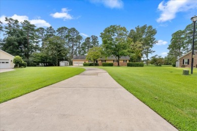 Welcome to this charming 3-bedroom, 2-bath ranch-style home on Santee-Cooper Country Club in South Carolina - for sale on GolfHomes.com, golf home, golf lot