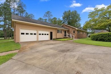 Welcome to this charming 3-bedroom, 2-bath ranch-style home on Santee-Cooper Country Club in South Carolina - for sale on GolfHomes.com, golf home, golf lot