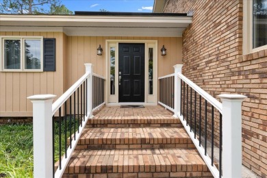 Welcome to this charming 3-bedroom, 2-bath ranch-style home on Santee-Cooper Country Club in South Carolina - for sale on GolfHomes.com, golf home, golf lot