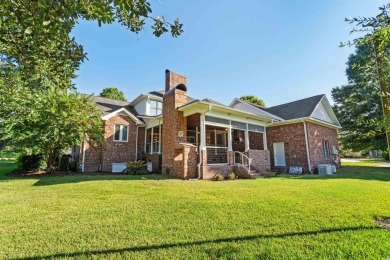 This beautiful all-brick traditional home is situated on a on The Dunes Golf and Beach Club in South Carolina - for sale on GolfHomes.com, golf home, golf lot