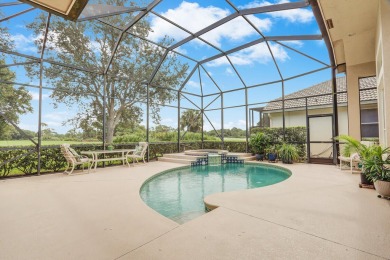 STUNNING POOL HOME WITH SWEEPING GOLF COURSE VIEW IN PGA on PGA Golf Club in PGA Village in Florida - for sale on GolfHomes.com, golf home, golf lot