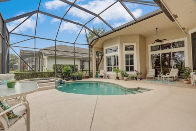 STUNNING POOL HOME WITH SWEEPING GOLF COURSE VIEW IN PGA on PGA Golf Club in PGA Village in Florida - for sale on GolfHomes.com, golf home, golf lot