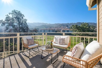 Located behind the gates of Rossmoor, this light-filled home on Rossmoor Golf Course in California - for sale on GolfHomes.com, golf home, golf lot