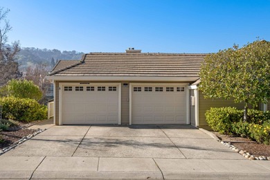 Located behind the gates of Rossmoor, this light-filled home on Rossmoor Golf Course in California - for sale on GolfHomes.com, golf home, golf lot