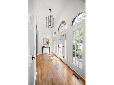 Beautifully renovated and thoughtfully designed, this 4-bedroom on Woodside Plantation Country Club in South Carolina - for sale on GolfHomes.com, golf home, golf lot