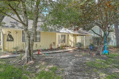Tucked within the serene enclave of Snee Farm Gardens on the on Snee Farm Country Club in South Carolina - for sale on GolfHomes.com, golf home, golf lot