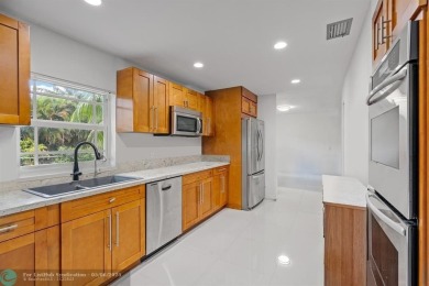Nestled in the heart of Doral Park, this stunning 4-bedroom, 2 on Jim McLean Signature Course in Florida - for sale on GolfHomes.com, golf home, golf lot