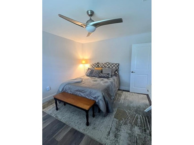 This fabulous OPEN FLOOR PLAN 2/2 at Hunters Run Country Club on Hunters Run Golf and Country Club in Florida - for sale on GolfHomes.com, golf home, golf lot