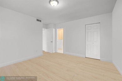 Nestled in the heart of Doral Park, this stunning 4-bedroom, 2 on Jim McLean Signature Course in Florida - for sale on GolfHomes.com, golf home, golf lot