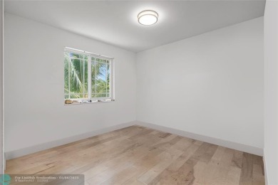 Nestled in the heart of Doral Park, this stunning 4-bedroom, 2 on Jim McLean Signature Course in Florida - for sale on GolfHomes.com, golf home, golf lot