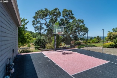 Stunning home nestled on a beautifully landscaped almost on Roseburg Country Club in Oregon - for sale on GolfHomes.com, golf home, golf lot