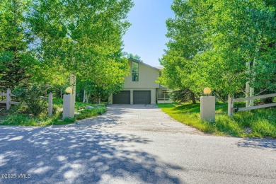 Tucked into the trees on a quiet cul-de-sac in Singletree's on Sonnenalp Golf Club in Colorado - for sale on GolfHomes.com, golf home, golf lot