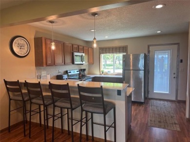 Welcome to Izatys Beach Villa, a 3 bedroom 3 bath retreat on Izatys Golf and Yacht Club in Minnesota - for sale on GolfHomes.com, golf home, golf lot
