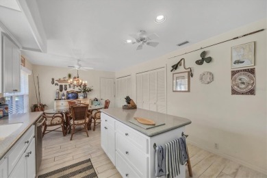 Nestled at the end of a peaceful cul-de-sac in OYSTER CREEK (one on Oyster Creek Golf Club in Florida - for sale on GolfHomes.com, golf home, golf lot