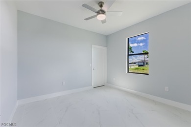 Discover the perfect blend of comfort, style, and location in on Burnt Store Golf Club in Florida - for sale on GolfHomes.com, golf home, golf lot