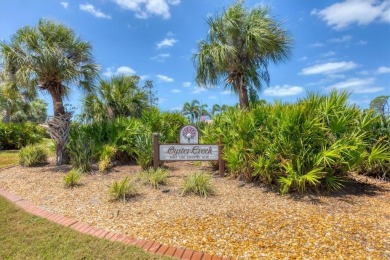 Nestled at the end of a peaceful cul-de-sac in OYSTER CREEK (one on Oyster Creek Golf Club in Florida - for sale on GolfHomes.com, golf home, golf lot