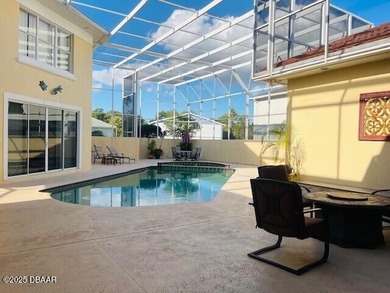 Spruce Creek Taxiway home offers the perfect fusion of on Spruce Creek Golf Club in Florida - for sale on GolfHomes.com, golf home, golf lot