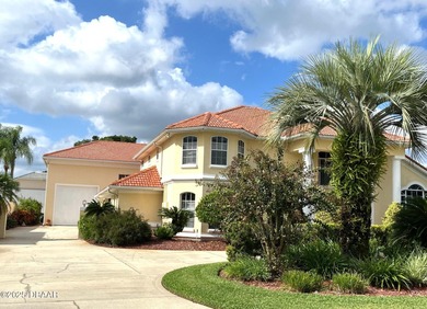 Spruce Creek Taxiway home offers the perfect fusion of on Spruce Creek Golf Club in Florida - for sale on GolfHomes.com, golf home, golf lot