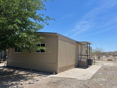 This fully updated, 3-bedroom 2 bath home is move-in ready and on Mt. Graham Municipal Golf Course in Arizona - for sale on GolfHomes.com, golf home, golf lot