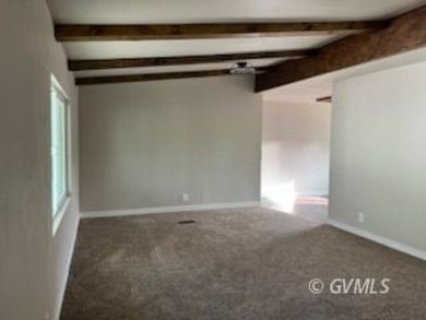 This fully updated, 3-bedroom 2 bath home is move-in ready and on Mt. Graham Municipal Golf Course in Arizona - for sale on GolfHomes.com, golf home, golf lot