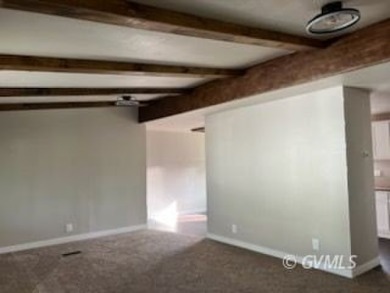 This fully updated, 3-bedroom 2 bath home is move-in ready and on Mt. Graham Municipal Golf Course in Arizona - for sale on GolfHomes.com, golf home, golf lot
