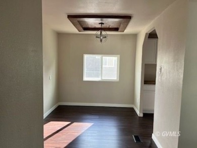This fully updated, 3-bedroom 2 bath home is move-in ready and on Mt. Graham Municipal Golf Course in Arizona - for sale on GolfHomes.com, golf home, golf lot