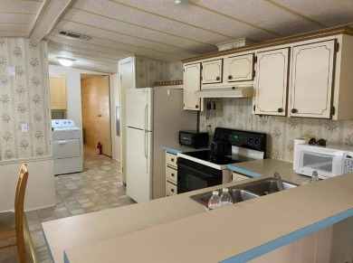 Welcome Home! This well-maintained home offers a great open on Golden Lakes Golf Course in Florida - for sale on GolfHomes.com, golf home, golf lot