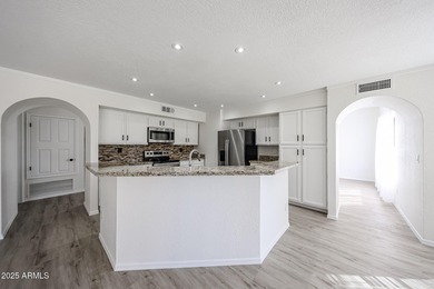 4 bedrooms, 2.5 bathrooms and 2.5 car garage with a large on Arrowhead Country Club in Arizona - for sale on GolfHomes.com, golf home, golf lot