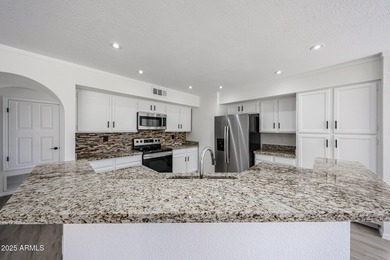 4 bedrooms, 2.5 bathrooms and 2.5 car garage with a large on Arrowhead Country Club in Arizona - for sale on GolfHomes.com, golf home, golf lot