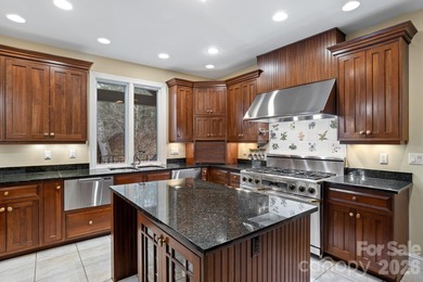 Exceptional luxury home situated on 2 private acres overlooking on Kenmure Country Club in North Carolina - for sale on GolfHomes.com, golf home, golf lot