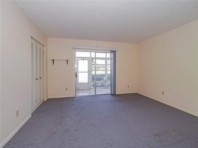 First Floor 1BDR/1BA condo with lake views in active 55+ on The American Golf Club in Florida - for sale on GolfHomes.com, golf home, golf lot