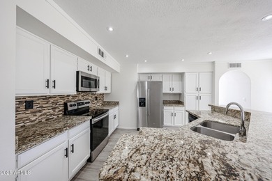 4 bedrooms, 2.5 bathrooms and 2.5 car garage with a large on Arrowhead Country Club in Arizona - for sale on GolfHomes.com, golf home, golf lot