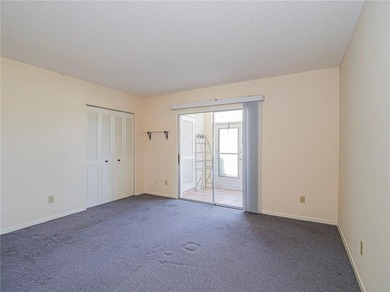 First Floor 1BDR/1BA condo with lake views in active 55+ on The American Golf Club in Florida - for sale on GolfHomes.com, golf home, golf lot