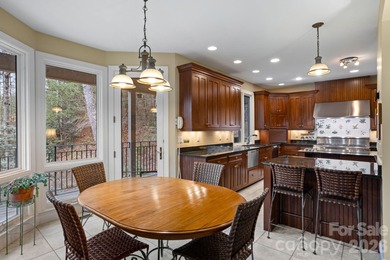 Exceptional luxury home situated on 2 private acres overlooking on Kenmure Country Club in North Carolina - for sale on GolfHomes.com, golf home, golf lot