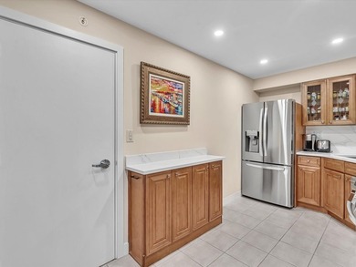 Super stylish kitchen with new quartz countertops, designer on Coral Ridge Country Club in Florida - for sale on GolfHomes.com, golf home, golf lot