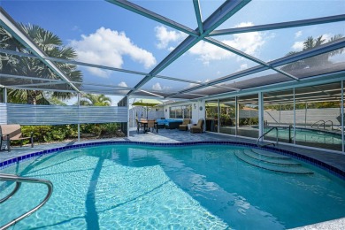 Introducing a charming oasis nestled near the vibrant and on Jacaranda West Country Club in Florida - for sale on GolfHomes.com, golf home, golf lot