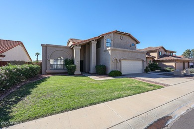 4 bedrooms, 2.5 bathrooms and 2.5 car garage with a large on Arrowhead Country Club in Arizona - for sale on GolfHomes.com, golf home, golf lot