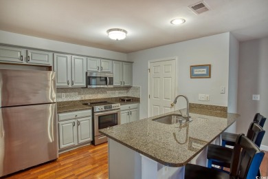 Welcome home to true Southern charm in the heart of Murrells on International Club of Myrtle Beach in South Carolina - for sale on GolfHomes.com, golf home, golf lot