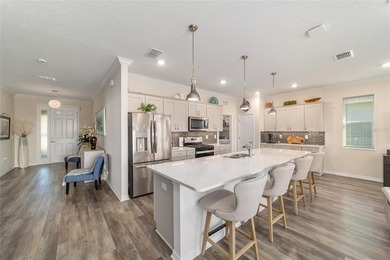 Move-in ready and like new, this 2023 Ginger model Smart Home on Candler Hills Golf and Country Club in Florida - for sale on GolfHomes.com, golf home, golf lot