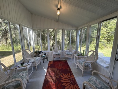 This home is located within Cypress Lakes Village 55+ resort on Big Cypress Golf and Country Club in Florida - for sale on GolfHomes.com, golf home, golf lot