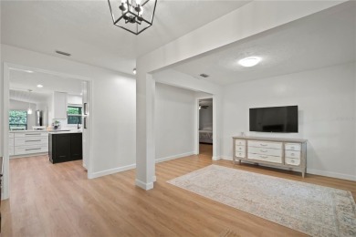 This beautifully maintained single-story home in Lake Padgett on Plantation Palms Golf Club in Florida - for sale on GolfHomes.com, golf home, golf lot