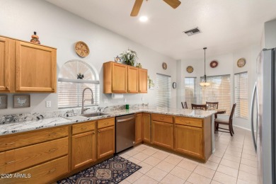 Fall in love with this spacious 3-bed, 2-bath gem featuring a on Coyote Lakes Golf Club in Arizona - for sale on GolfHomes.com, golf home, golf lot