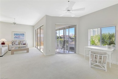 Enjoy elevated coastal living in this top-floor end unit at on Club at Pelican Bay Golf Course in Florida - for sale on GolfHomes.com, golf home, golf lot