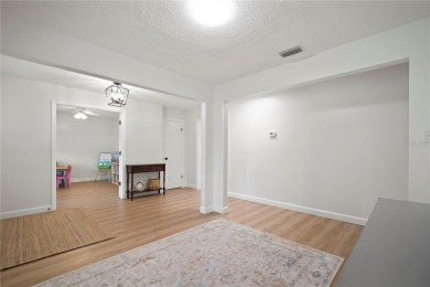 This beautifully maintained single-story home in Lake Padgett on Plantation Palms Golf Club in Florida - for sale on GolfHomes.com, golf home, golf lot