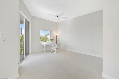 Enjoy elevated coastal living in this top-floor end unit at on Club at Pelican Bay Golf Course in Florida - for sale on GolfHomes.com, golf home, golf lot